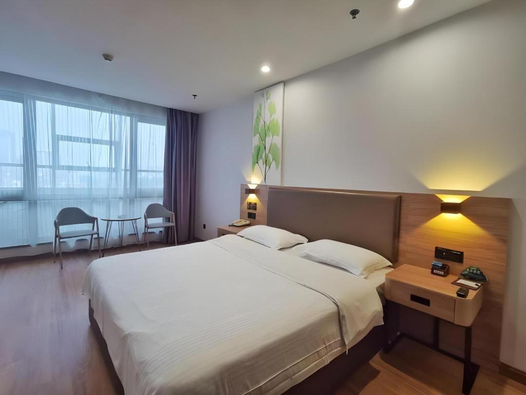 Greentree Inn Jining Yanzhou Jiuzhou Fangyuan Business Hotel מראה חיצוני תמונה