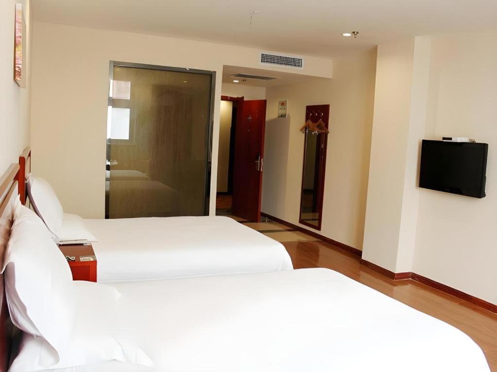 Greentree Inn Jining Yanzhou Jiuzhou Fangyuan Business Hotel מראה חיצוני תמונה